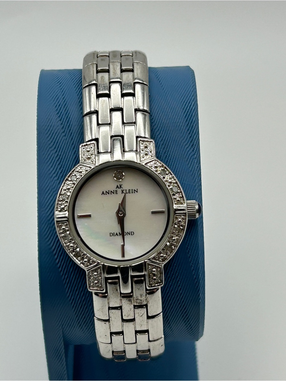 Anne Klein diamond watch 9 diamonds stainless mother of pearl face